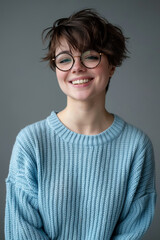 Radiant Young Woman with glasses and Light Blue Sweater