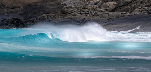 waves crashing on the beach