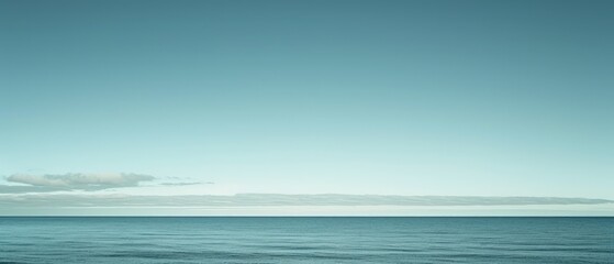 Fototapeta premium Serene Ocean Horizon with Clear Blue Skies