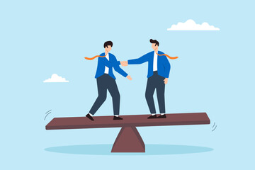 Two business people handshake and balancing on seesaw