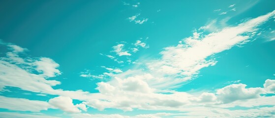 Fototapeta na wymiar Expansive Blue Sky with Soft Clouds