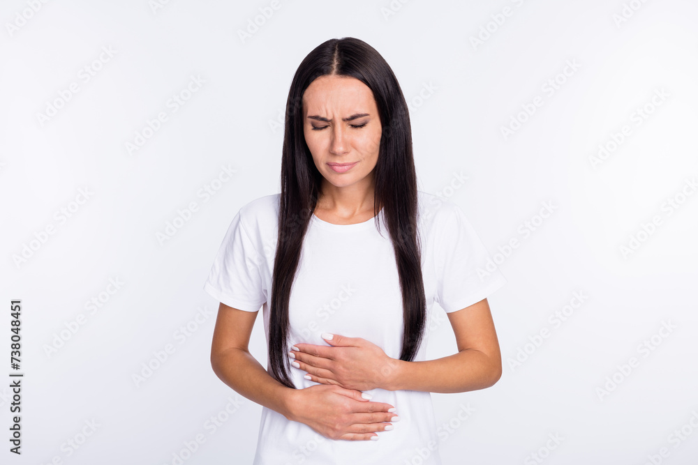 Sticker Photo portrait of woman feeling herself bad got stomach ache isolated on white color background