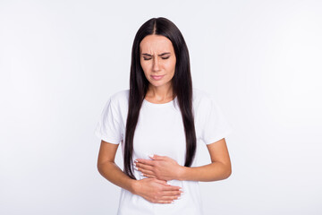 Photo portrait of woman feeling herself bad got stomach ache isolated on white color background