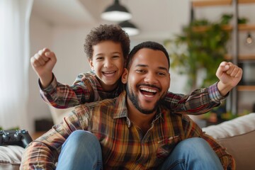 Happy dad with his young boy laughing and enjoying time together, symbolizing family joy and love - obrazy, fototapety, plakaty