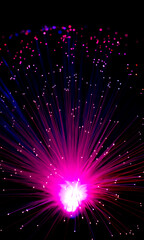Electric purple lights illuminate the black background optical fibers