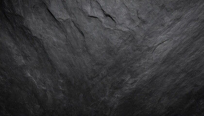 A close-up of dark, rugged rock textures, highlighting the intricate patterns and deep shadows, Ideal for backgrounds, nature themes, or abstract art.