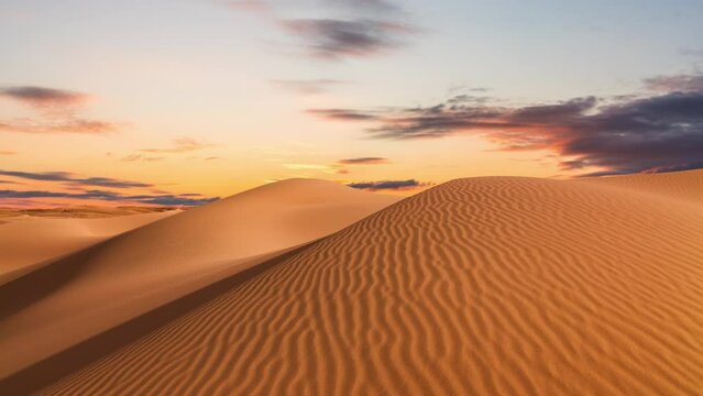 Timelapse of sunset over the sand dunes in the desert. Gobi desert