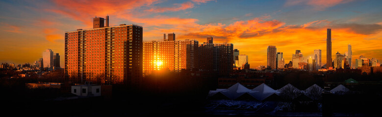 New York City High Rise Residential Red Brick Buildings in Brooklyn with Manhattan Skyline in the...