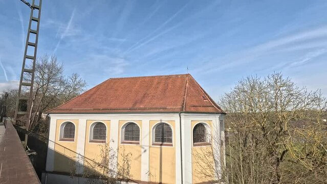 At the confluence of the Naab and the Danube, the Mariaort pilgrimage church is located directly on the railway tracks