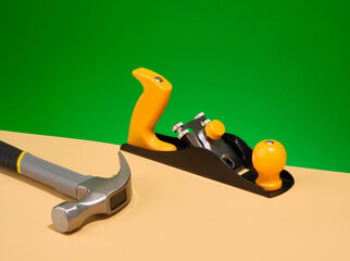 Planer and hammer. DIY construction tools. - obrazy, fototapety, plakaty