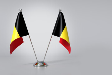 Double Kingdom of Belgium Table Flag on Gray Background. 3d Rendering