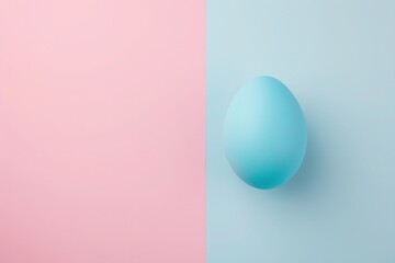 a blue egg is sitting on a pink and blue background