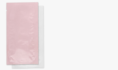 Disposable packaging forcosmetic pink and white. on a light background.