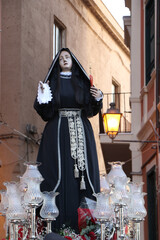 Holy Week Rites in Taranto. Brothers in procession. Procession of the Most Blessed Virgin of Our Sorrows. Puglia, Italy 