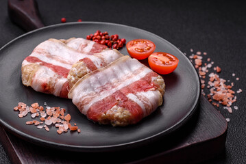 Round minced chicken or pork cutlet wrapped in bacon with salt, spices and herbs
