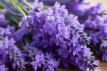 A Bunch of Purple Flowers on a Wooden Table