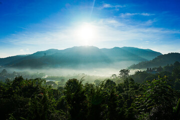 Beautiful Landscape of sunrise on mountain and winter fog at Doi Luang ChiangDao, ChiangMai, Thailand.
