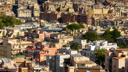 Aerial view on the houses and buildings of a residential district in the historic center of Rome,...
