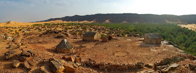 West Africa, Mauritania. View of the village of Guelta with houses of traditional architecture, located near an oasis in the middle of the stone desert in the south-west of the Sahara.