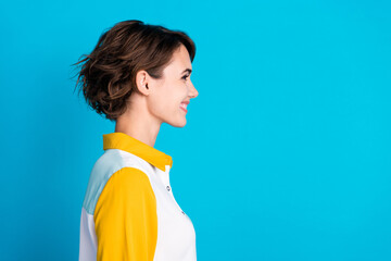 Side profile photo of cheerful girl bob brown hair in yellow white shirt look empty space business...