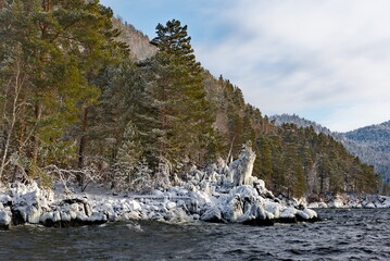 Russia, south of Western Siberia, Gorny Altai. View of the icy shore of Lake Teletskoye at the...