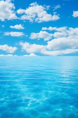 Obraz premium Blue sky and white clouds with the reflection in the water