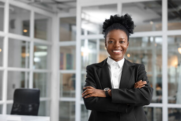 Happy woman with crossed arms in office, space for text. Lawyer, businesswoman, accountant or...