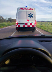 Driving behind an ambulance on local road © WH_Pics