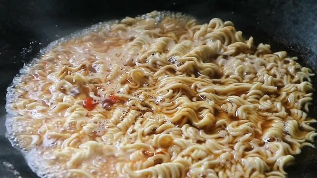 Cooking instant noodles or indomie