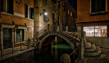 Small Bridge Over Small Canal at Night in Venice