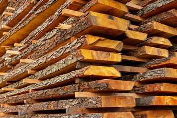 A boards in an industrial sawmill. Wood timber construction material