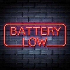 A visually striking neon sign in the shape of a battery with the word 'low' on it, attached to a rustic brick wall. The glowing signage symbolizes low energy or needs recharging against the contrastin