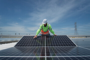 Engineers walking on roof inspect and check solar cell panel by hold equipment box and radio...