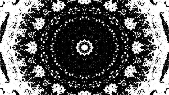kaleidoscope looping animated pattern background. animated video black and white mandala ornament pattern abstract grunge noise grain texture