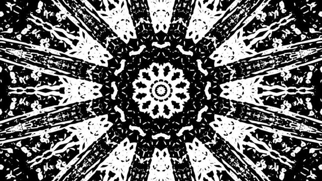 kaleidoscope looping animated pattern background. animated video black and white mandala ornament pattern abstract grunge noise grain texture