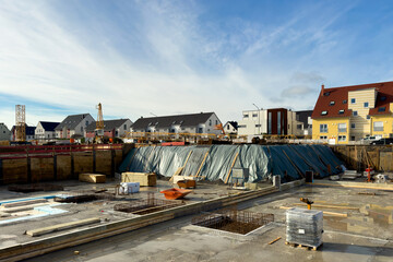 Construction site with the beginning of the construction of the foundation of a large building.
