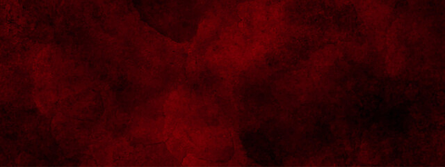 Dark red watercolor background. Abstract grunge hand-painted texture on the red color backdrop