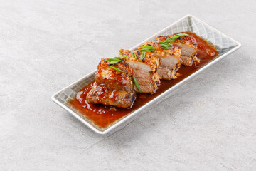 roasted appetizing pork on a stone background studio food photo 2