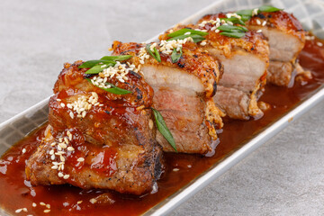 roasted appetizing pork on a stone background studio food photo 13