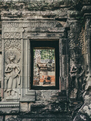 One of the entrances of the Hindu temple of the majestic Angkor Wat complex located near the city...