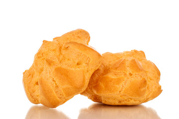 Two delicious eclairs, macro, isolated on white background.
