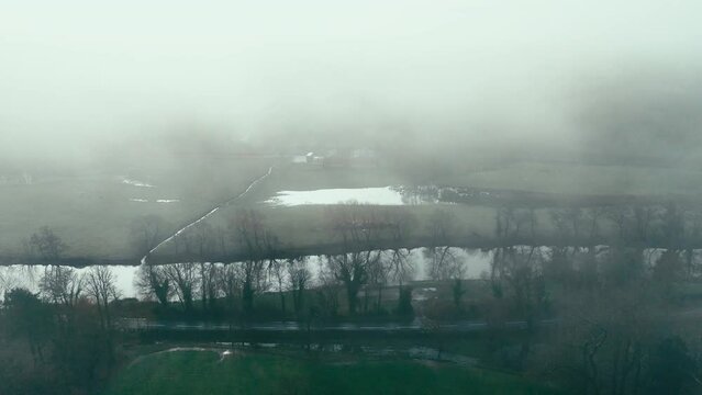 Ruswarp is a pretty village that lies in the scenic Esk Valley, just one mile south of Whitby. Misty Yorkshire landscape scene. Coastal winter setting