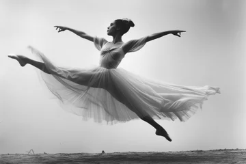 Fotobehang A ballerina defying gravity with a powerful leap, shattering conventional notions of femininity and showcasing physical prowess © Tymofii