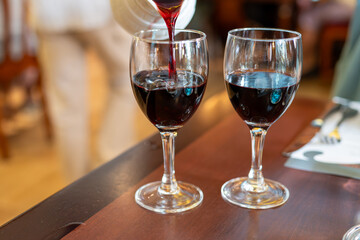 Red dry wine in glasses, lunch with wine in France,  Limouges, France