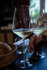 Tasting of Bordeaux white wine in Sauternes, left bank of Gironde Estuary, France. Glasses of white sweet French wine.