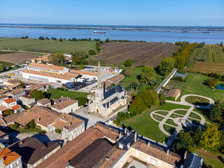 Aerial view on vineyards, Gironde river, wine domain or chateau in Haut-Medoc red wine making...
