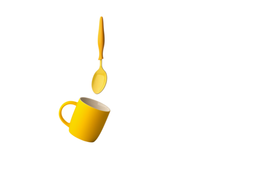 Yellow ceramic cup at a tilt with a spoon hovering over it. Png.