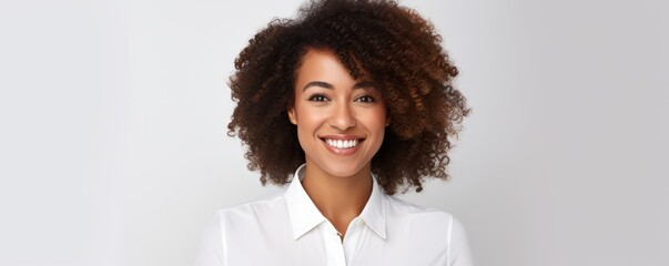 Happy, portrait and corporate woman with afro for a career, professional job or work headshot. Smile, business and face of a female employee looking elegant and isolated at white background