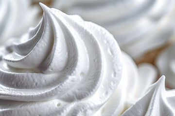 Fototapeta na wymiar Close up view of pure white cream, masterfully swirled to showcase its glossy peaks and smooth texture, embodying both simplicity and decadence