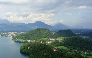 top view of gorgeous clear water blue lake and mountains around in slovenia 